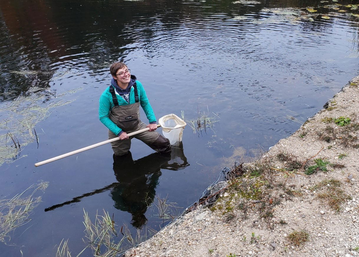 A photograph of Elizabeth Mandeville working at a field site.